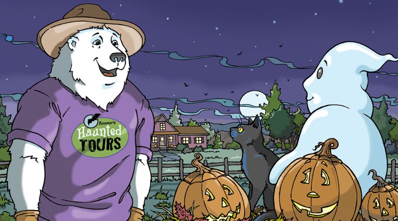 A friendly polar bear, Boomer wears a hat and purple shirt standing by a wagon full of pumpkins, with a ghost, black cat, and spooky Halloween decorations nearby.