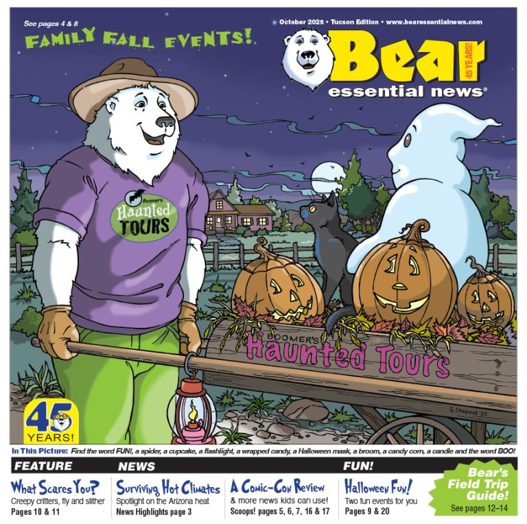A friendly polar bear, Boomer wears a hat and purple shirt standing by a wagon full of pumpkins, with a ghost, black cat, and spooky Halloween decorations nearby.