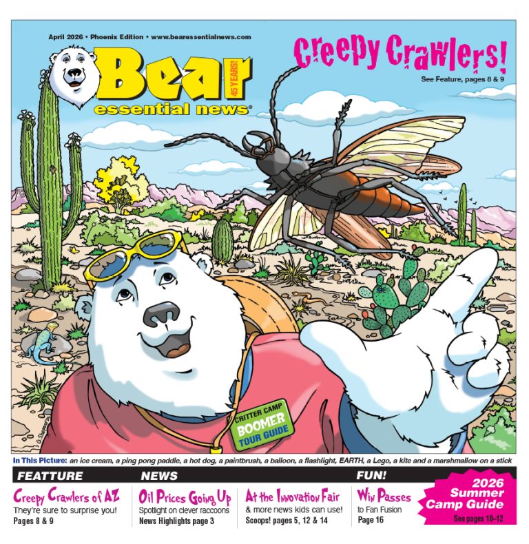 Boomer the polar bear smiles in the desert and points at a large flying insect above cacti and rocks under a blue sky.